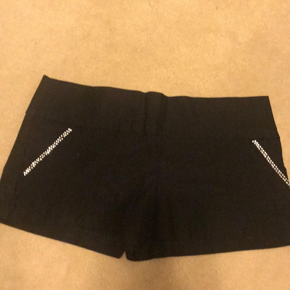 Black shorts with rhinestone pocket details